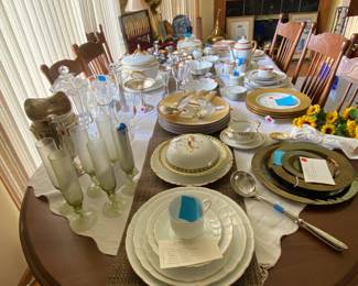 This is a table that will seat 20 people. In this picture it is simply loaded with elegant glassware and china while we were working to set things up.