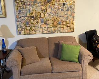 Like new 2 cushion sleeper sofa. Untitled abstract painting by Topeka artist, Margaret Ramburg, in the background. Impressive!