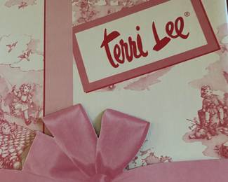 We have a reproduction Terri Lee doll that has never been removed from the box!