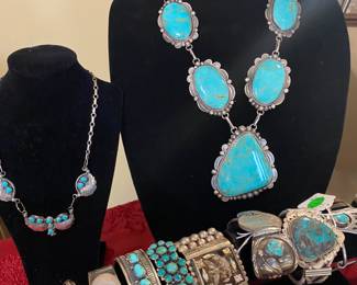 Beautiful large squash blossom necklace and a selection of Native American cuff bracelets