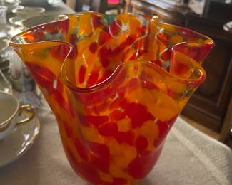Colorful fluted art glass vase.
