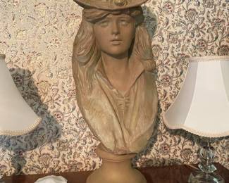 Large bust of young woman in the master BR