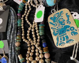 Double strand of Navajo pearls, beautiful strand of Tommy Singer beads, and more.