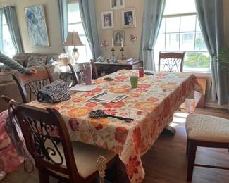 Dining room table extends to 109 w leafs in