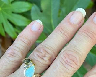 #91 - $325 - 14kt yellow gold ring with Opal and diamond 3.8 grams. sz 7.5 