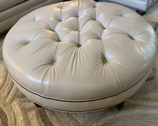 #3 - $200 - Bradington Young  taupe leather Ottoman 40"Roundx17