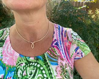 #86 - $950 - 14kt yellow gold V-shape necklace 1/2 ct diamonds . 16.1 grams  