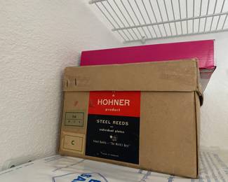 #23 - $300 Hohner diatonic accordion with box. 