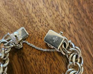 #93B - $1,800 - 14kt yellow gold charm bracelet all double links. 46 grams.