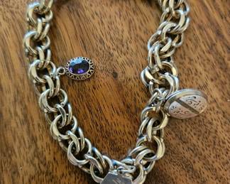 #93B - $1,800 - 14kt yellow gold charm bracelet all double links. 46 grams.