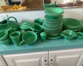 #121- $400 - Homer Laughlin Harlequin Fiestaware Light green set 103 pieces approx. or $10 a piece except marked differently