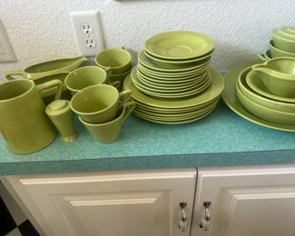 #116- $400 - Homer Laughlin Harlequin Fiestaware Chartreuse green set 37 pieces approx. or $10 a piece except marked differently
