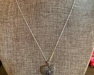 $30 - Sterling heart with amethyst center on chain