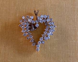 $195 - 14kt yellow gold heart with diamond