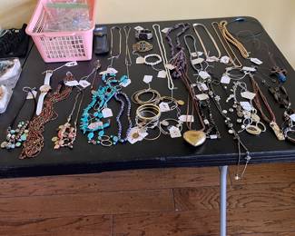 Assorted jewelry and Disney watches