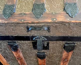 $190 large metal and wood chest with material lined inside compartments 