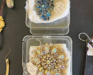 Assorted jewelry and Disney watches