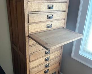 $400 antique Heirloom cabinet with pull out shelf and 12 drawers 25 W  x 21 D x 60H