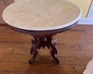$195 oval marble top table 39W x 24D x 30H