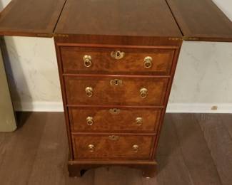 Tall chest with fold out leaves