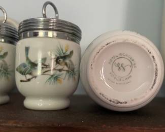 Backside of set of small painted dishes 