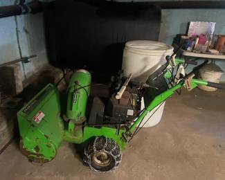 Vintage lawn clipper in basement 