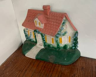 Quaint cottage with vines ceramic doorstopper 