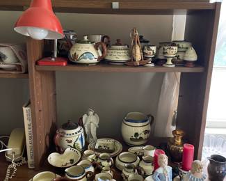 Portion of shelf in office 