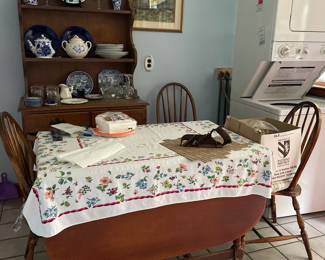 Wooden kitchen table and three matching chairs 