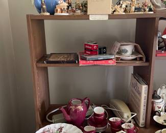 Portion of shelf in office 