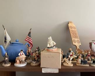 Knick knacks on top shelf in office 