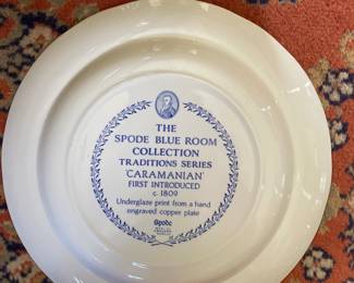 Bottom side of white and blue decorative ceramic plate