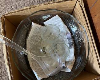 Box of assorted glassware in den 