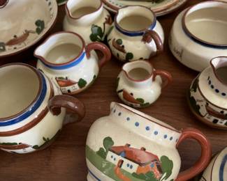 Collection of white tea set, painted scenes of quaint neighborhood 
