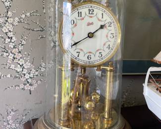 Gold and glass encased clock 