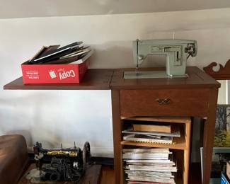 Wooden sewing table and assorted books/magazines
