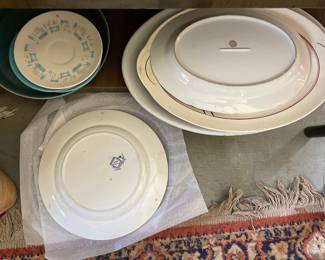 Bottom side of decorative ceramic dishes in den 