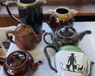 Assorted Earth-tone teapots 
