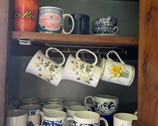 One kitchen cabinet of ceramic cups 