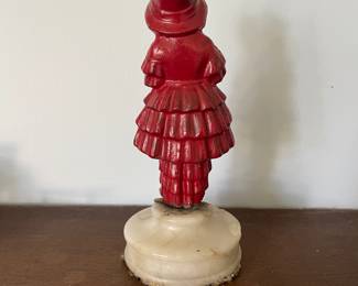 Backside of ceramic woman statue 