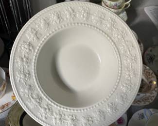 White, textured, radial fruit pattern shallow ceramic dish