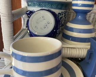 Bottom side of dark blue decorative dish in sunroom 