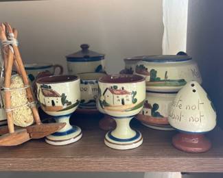 Set of dishes with a unique decorative design and quirky typography 