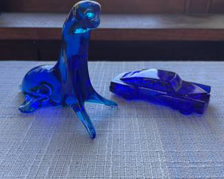 Blue glass seal, sports car knick knacks 