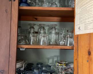 One kitchen cabinet of glass cups 