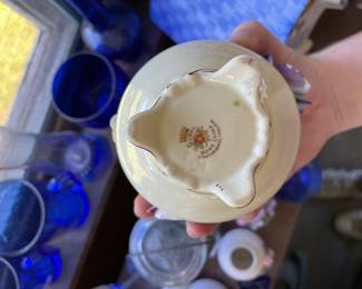 Bottom side of delicate floral ceramic piece 