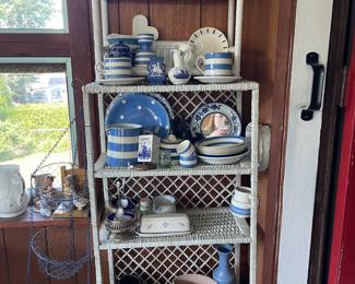 Entire shelf of white, blue, decorative ceramic dishes, various countries of origin 
