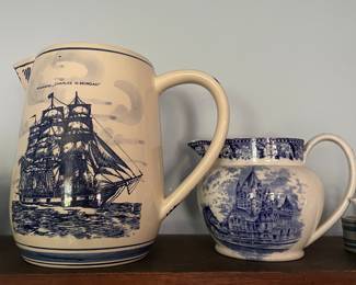 Two colonial blue painted spouted jugs 
