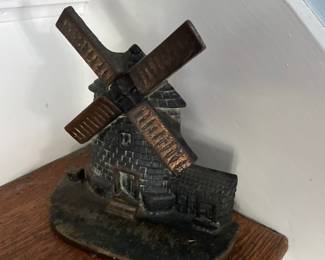Vintage metal mill doorstopper 