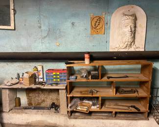 Bench and assorted tools, shelving unit in basement 
